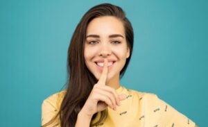 Photo of a female tampa business broker with her finger over her lip